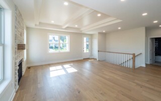 open living area with stairs to basement