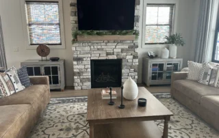 interior of home with stone fireplace