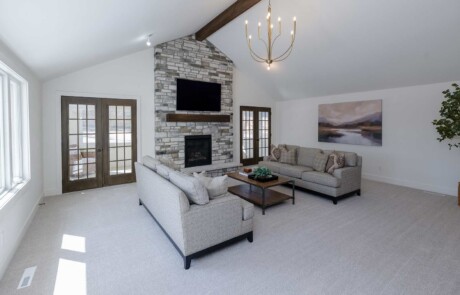 interior with open floor plan and large fireplace