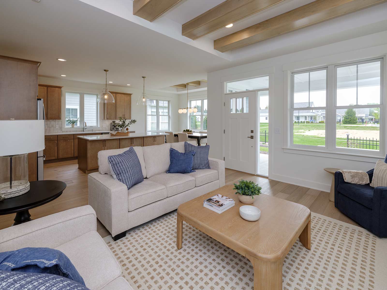 living area with exposed ceiling beams