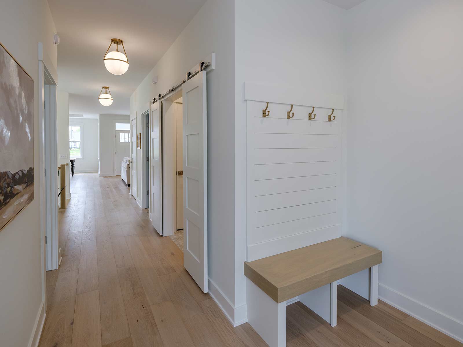 bright hallway and bench with