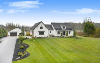 luxury home with long driveway