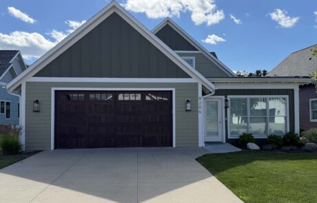 driveway view of sunroom addition